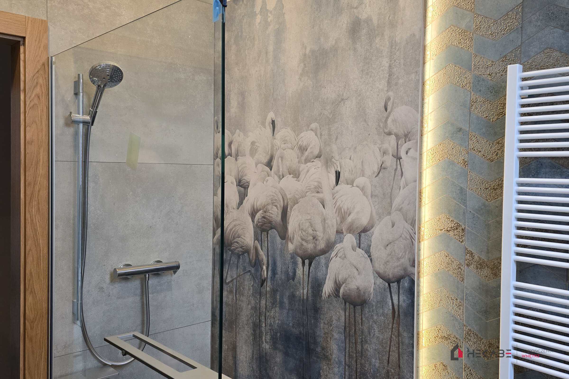 Hekabe bathroom with freestanding tub in the corner and a backlit shelf — Gawronów project